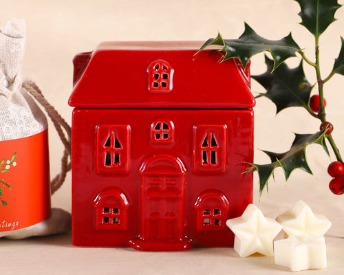 Rote Keramikhaus-Duftlampe