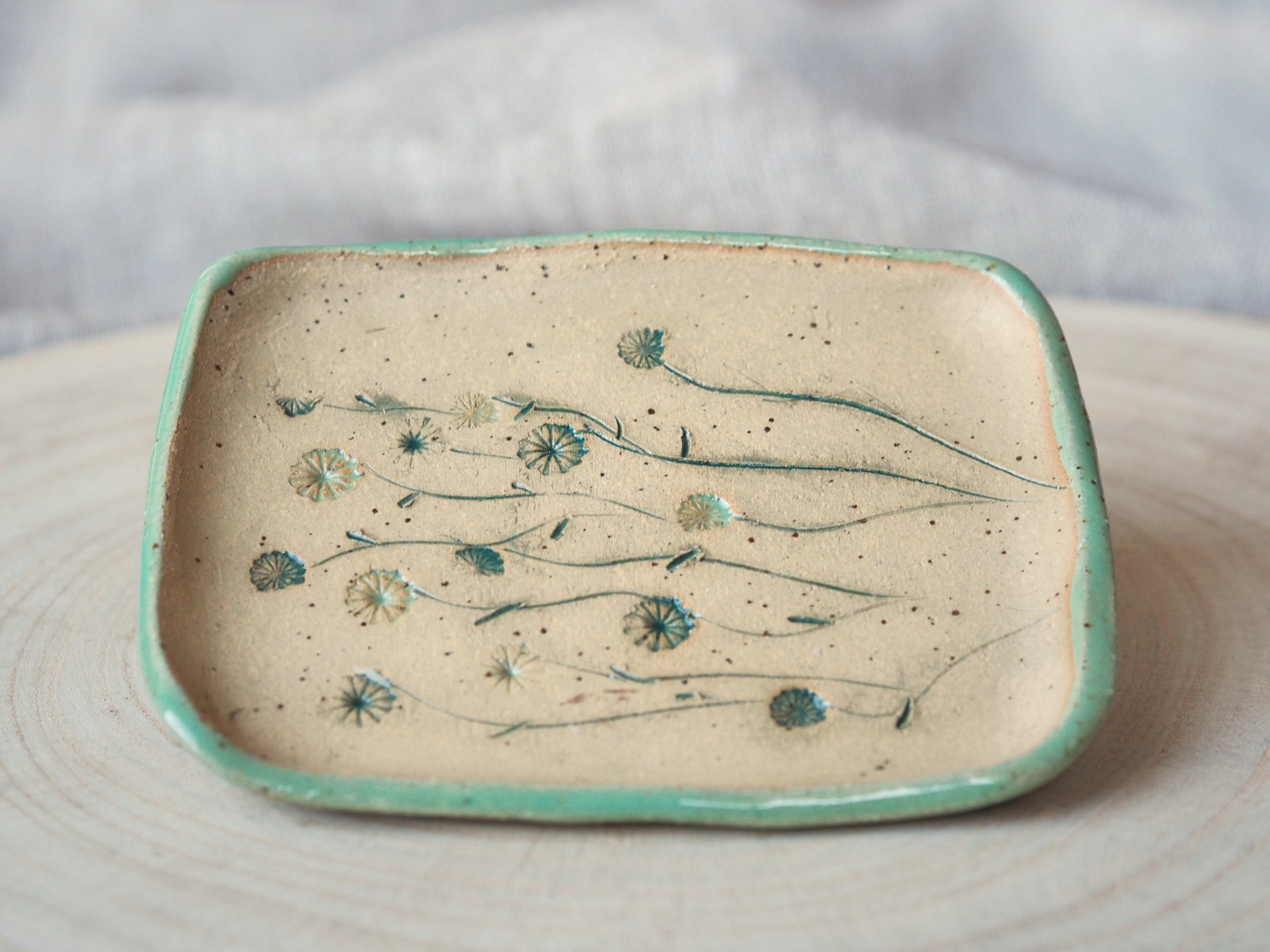 handmade ceramic soap dish POPPY with hand-pressed poppy seed pods