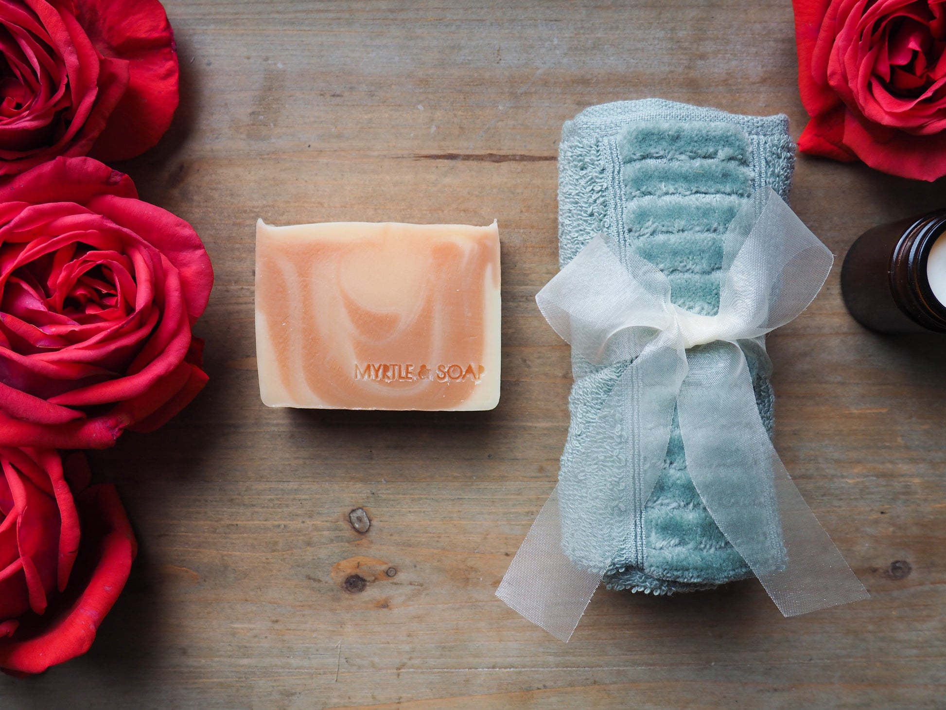 Box set with a luxurious Rose Blossom organic facial soap bar and a soft face towel made from 100% organic cotton